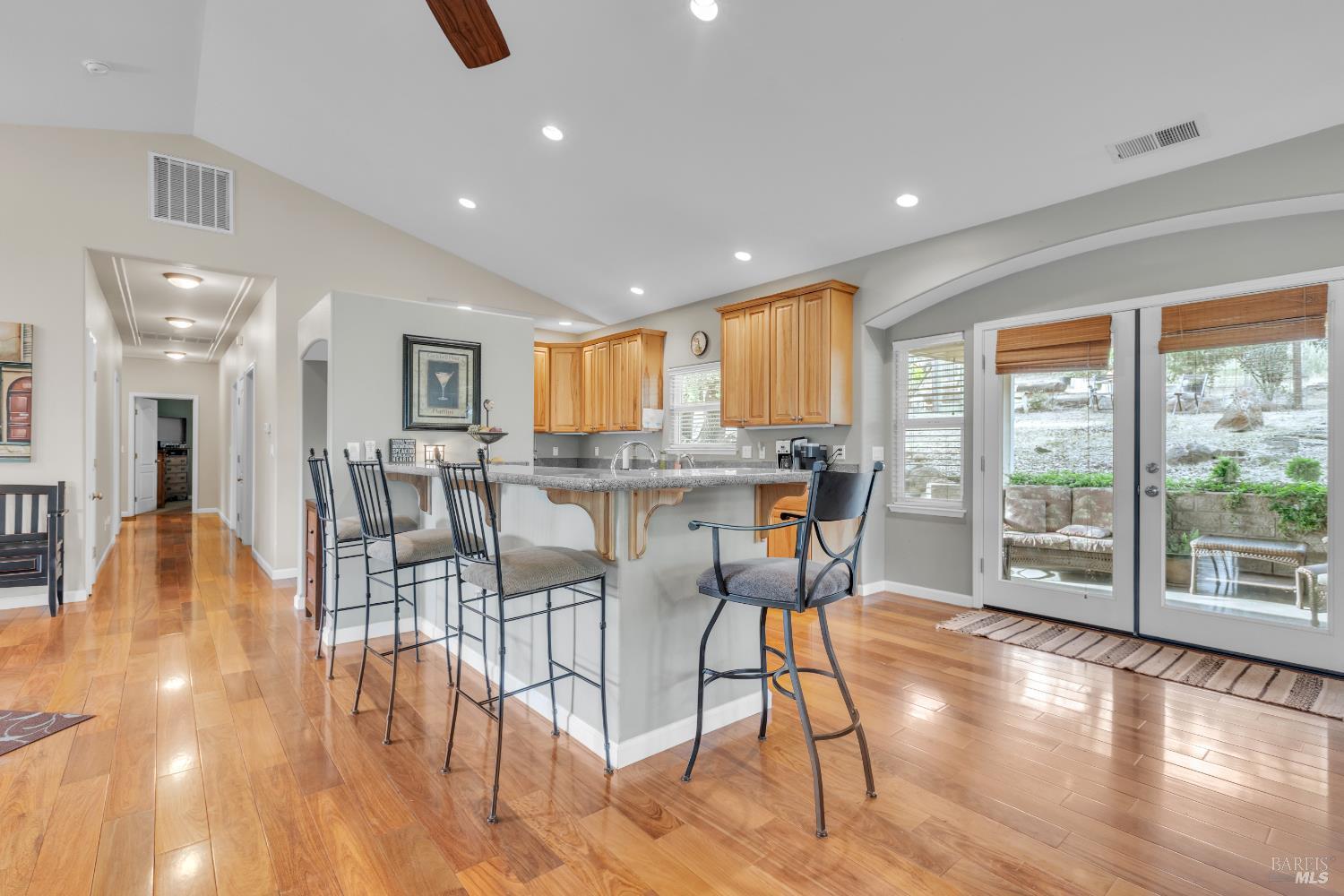 16911 Spruce Grove Road Hidden Valley Lake, CA 95467 - Photo 11 of 39 a view of a dining room with furniture window and wooden floor