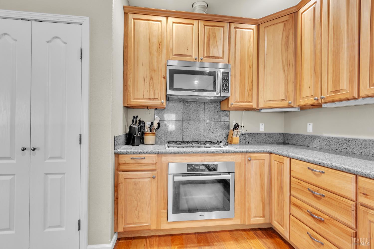 16911 Spruce Grove Road Hidden Valley Lake, CA 95467 - Photo 13 of 39 a kitchen with granite countertop cabinets stainless steel appliances and a sink