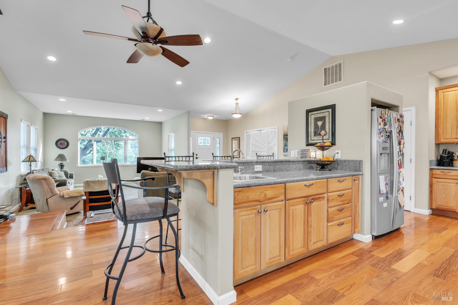 16911 Spruce Grove Road Hidden Valley Lake, CA 95467 - Photo 14 of 39 a kitchen with stainless steel appliances granite countertop white cabinets and window