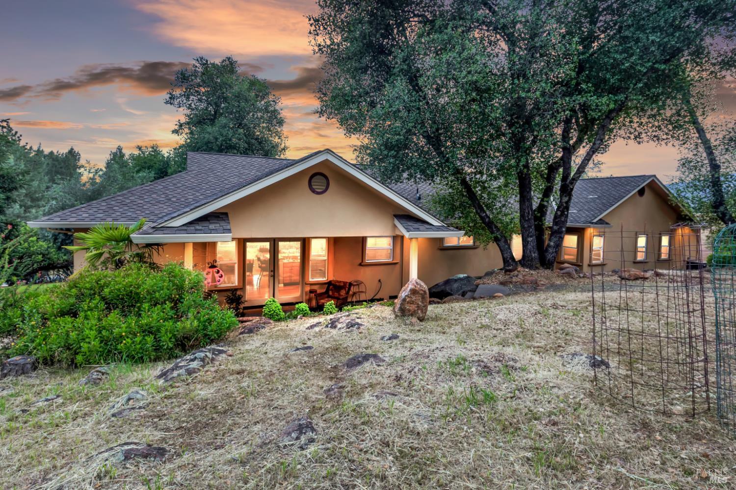 16911 Spruce Grove Road Hidden Valley Lake, CA 95467 - Photo 26 of 39 a front view of a house with garden