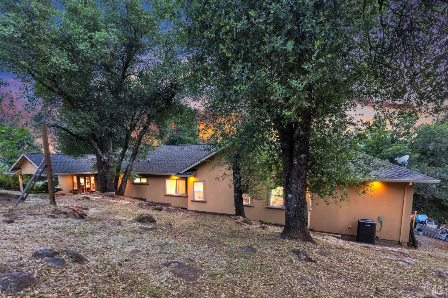 16911 Spruce Grove Road Hidden Valley Lake, CA 95467 - Photo 27 of 39 a view of a house with a yard