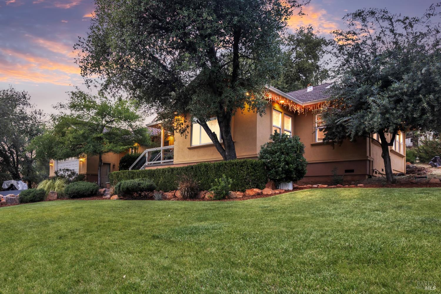 16911 Spruce Grove Road Hidden Valley Lake, CA 95467 - Photo 3 of 39 a front view of a house with a yard and trees