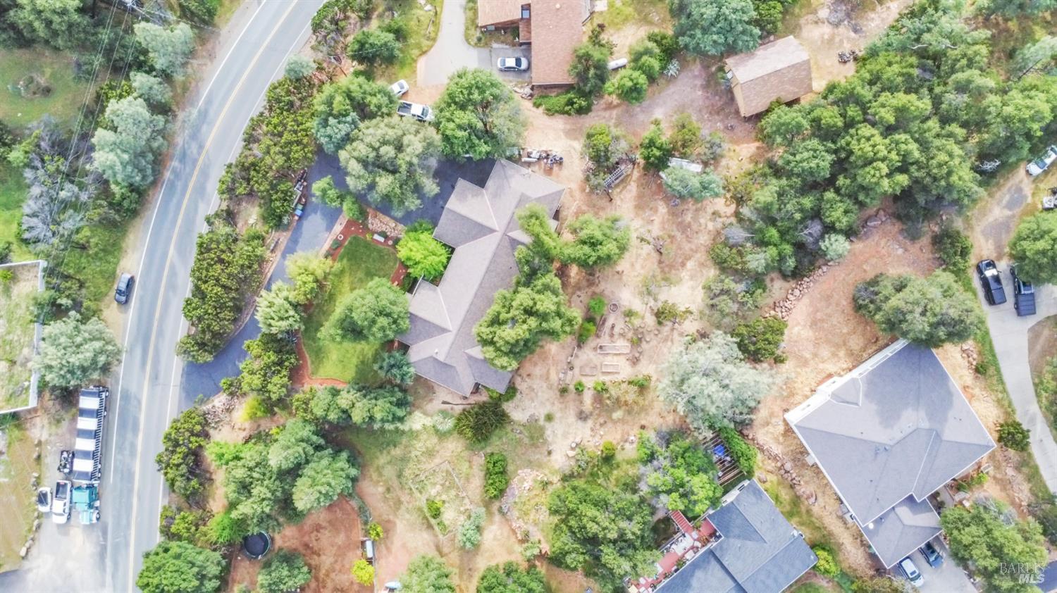 16911 Spruce Grove Road Hidden Valley Lake, CA 95467 - Photo 31 of 39 an aerial view of a house with yard