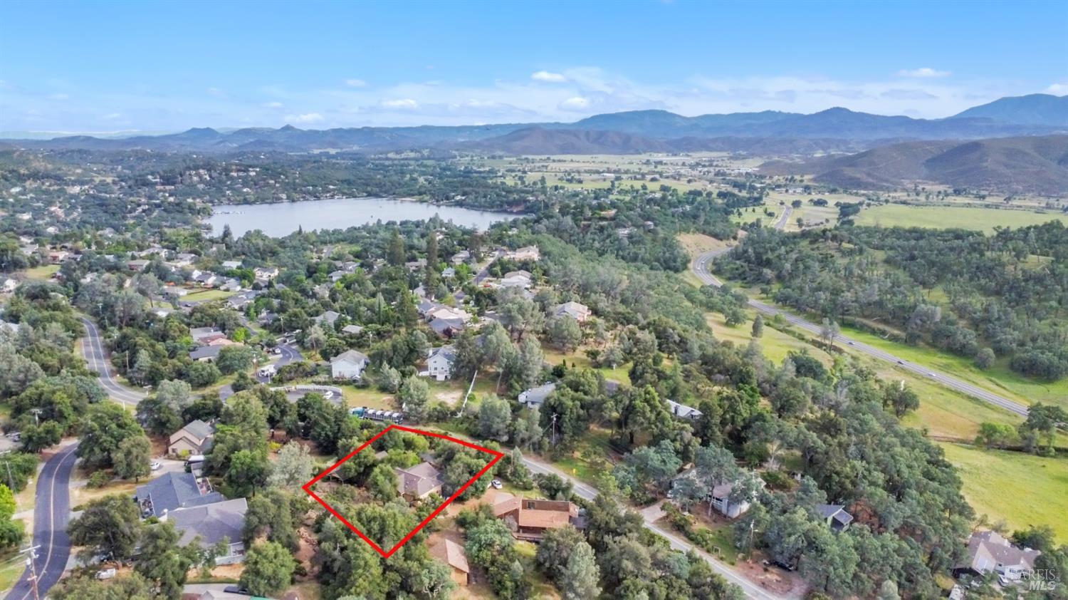 16911 Spruce Grove Road Hidden Valley Lake, CA 95467 - Photo 35 of 39 a view of a city with mountains in the background