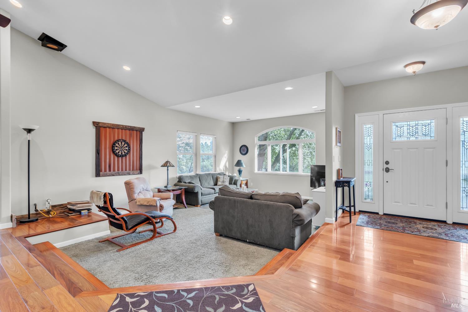 16911 Spruce Grove Road Hidden Valley Lake, CA 95467 - Photo 7 of 39 a living room with furniture and a wooden floor