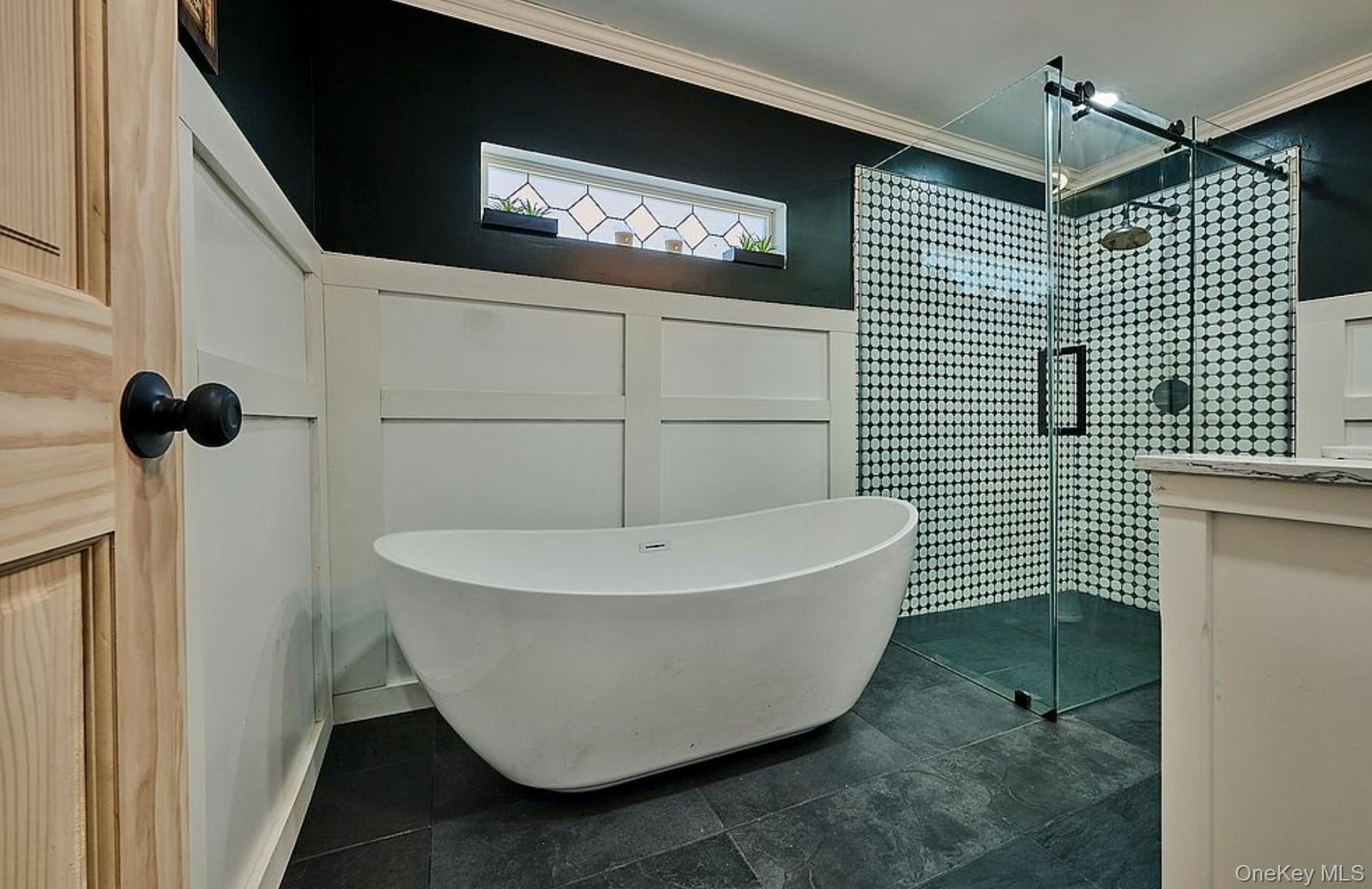 541 Cold Spring Road Monticello, NY 12701 - Photo 22 of 31 a bathroom with a bathtub and shower
