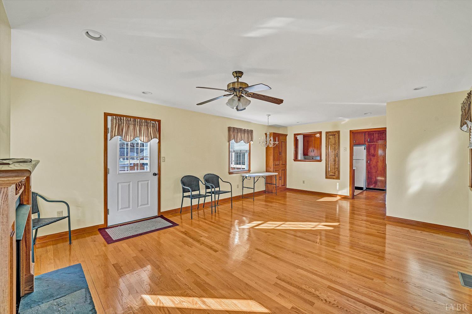 1524 Liggates Road Lynchburg, VA 24502 - Photo 12 of 31 a view of a livingroom with furniture a ceiling fan and window