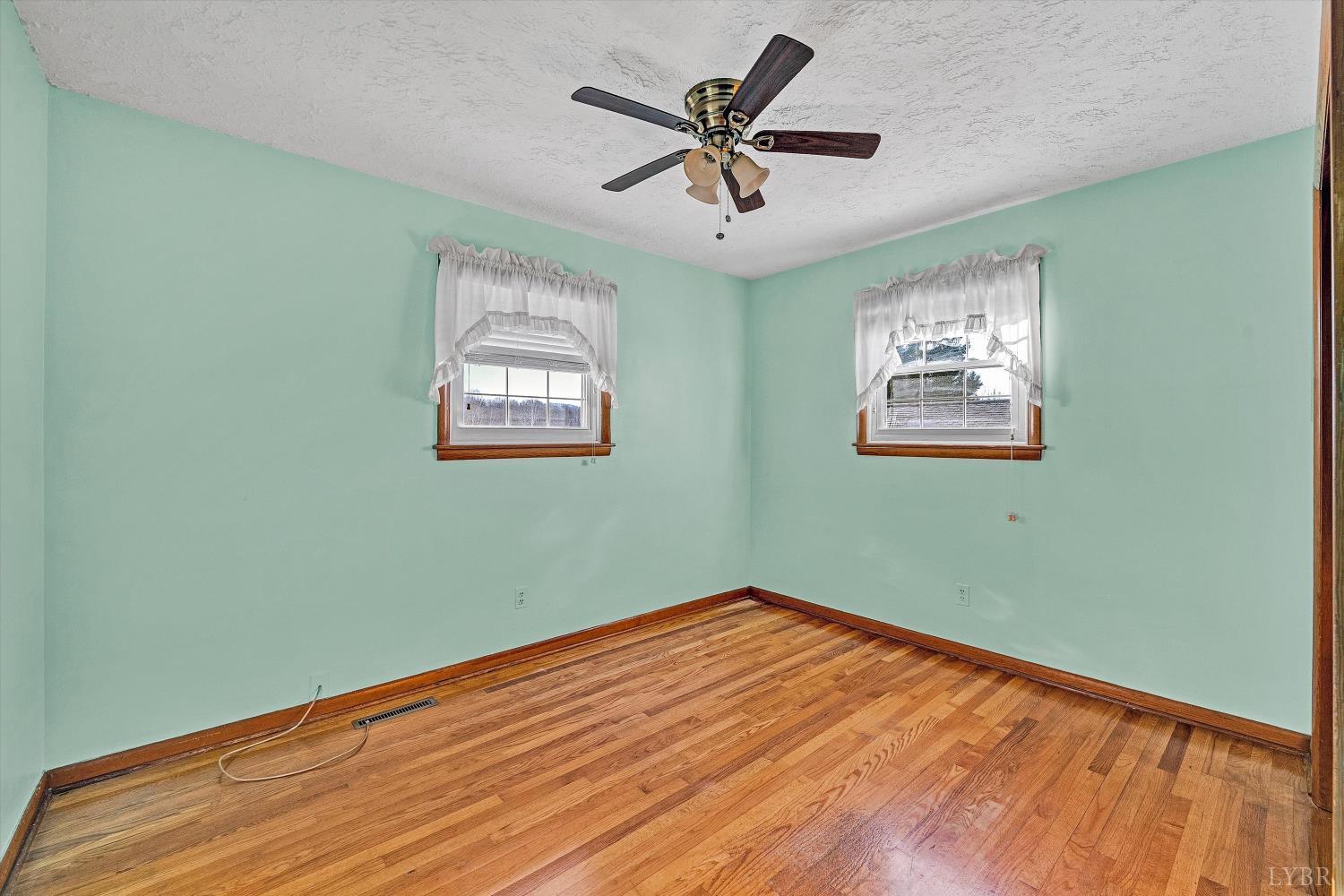1524 Liggates Road Lynchburg, VA 24502 - Photo 16 of 31 a view of empty room with wooden floor