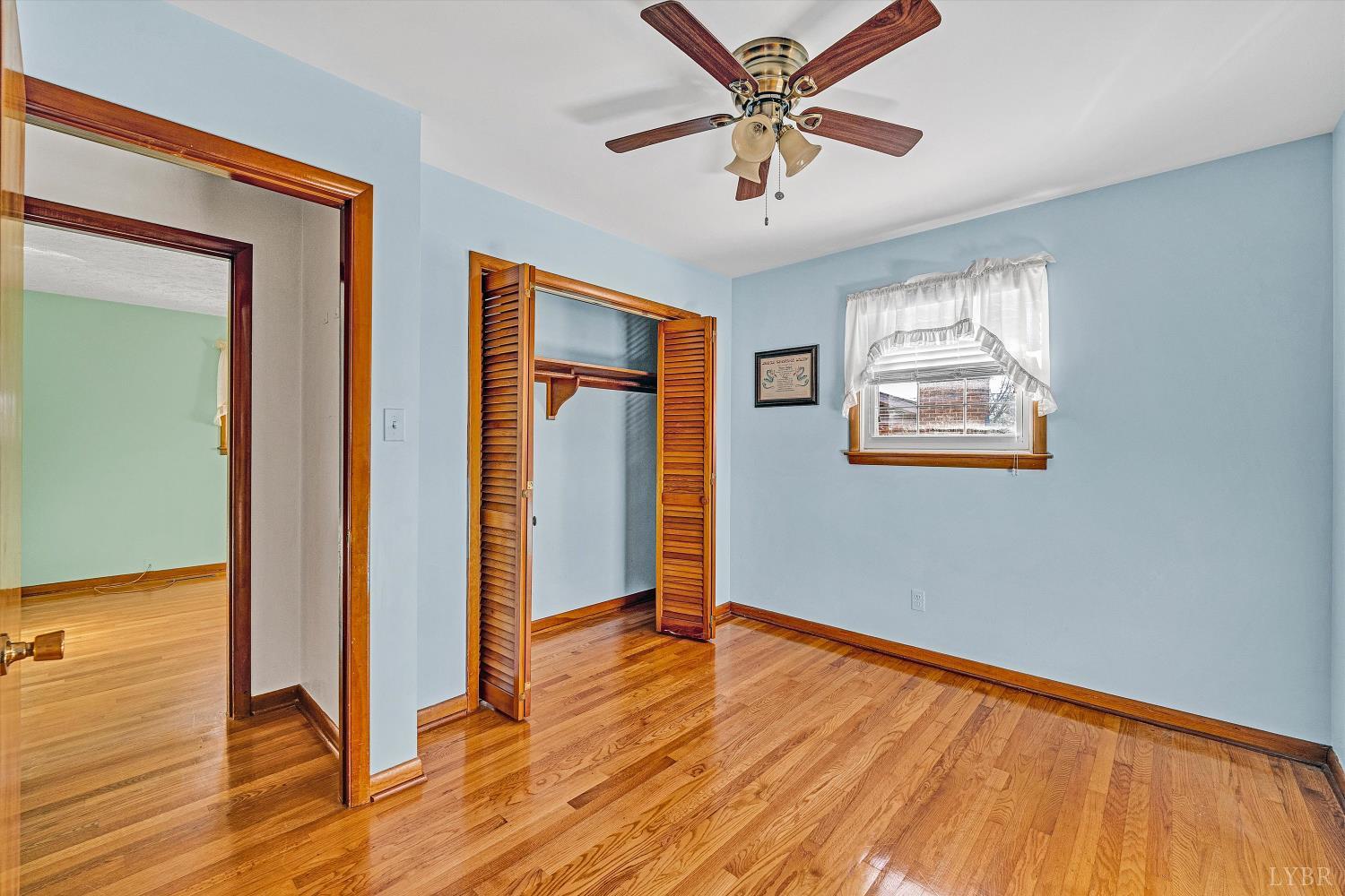 1524 Liggates Road Lynchburg, VA 24502 - Photo 20 of 31 wooden floor in an empty room with a window