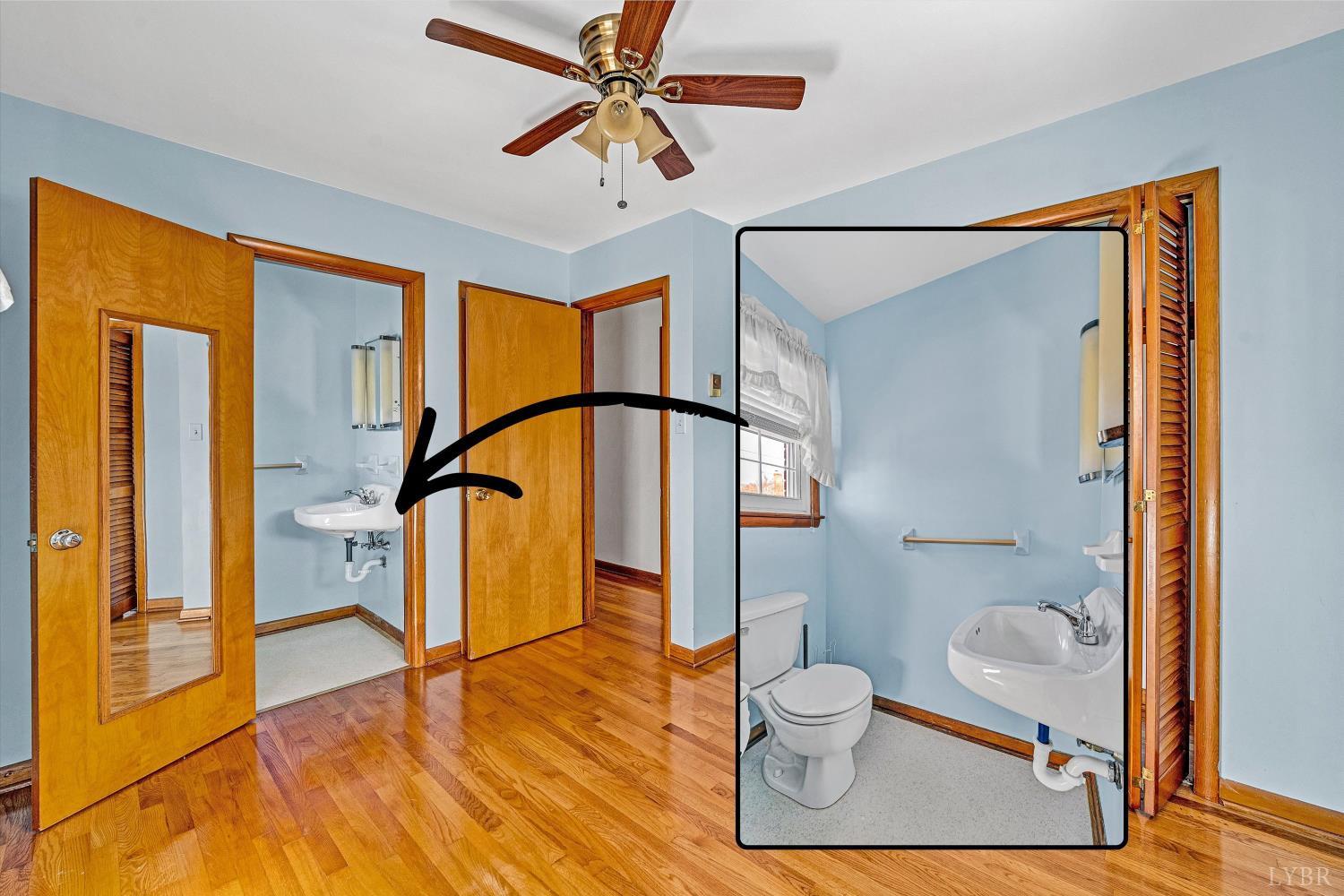 1524 Liggates Road Lynchburg, VA 24502 - Photo 21 of 31 a bathroom with a sink a toilet and shower