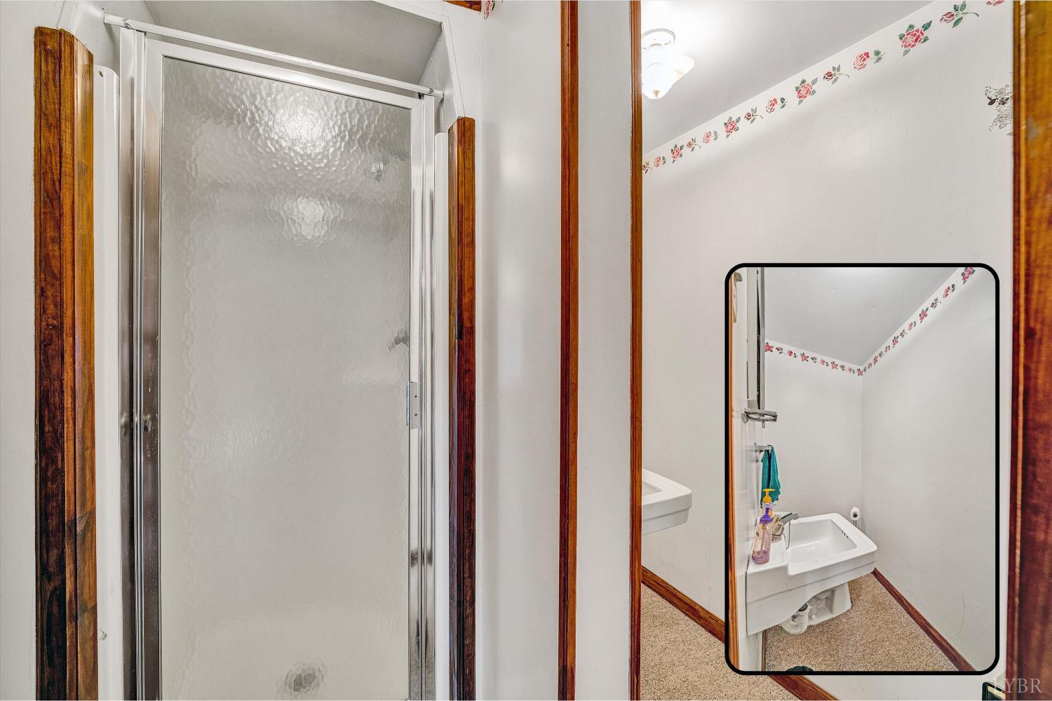 1524 Liggates Road Lynchburg, VA 24502 - Photo 26 of 31 a bathroom with a mirror and a shower