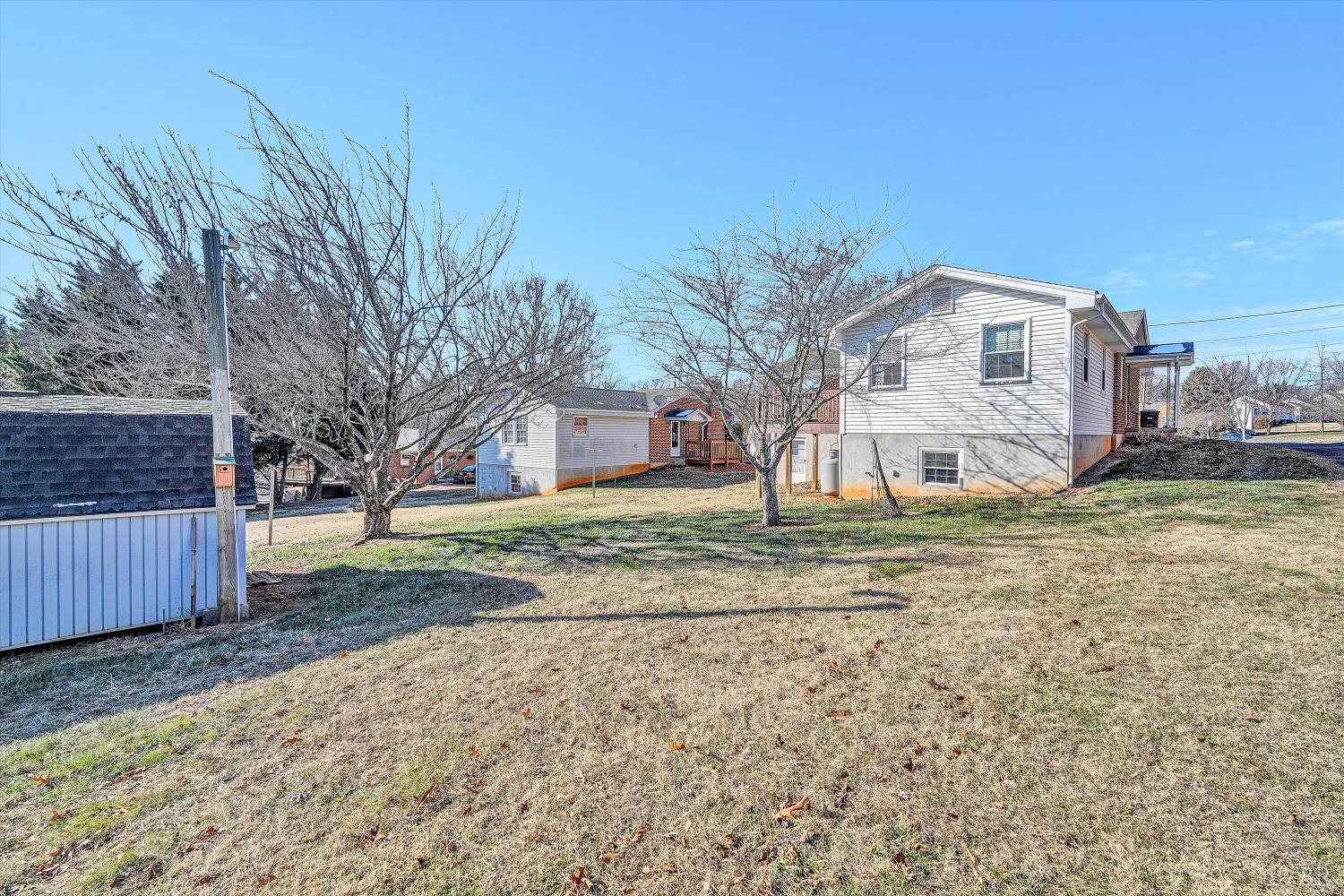 1524 Liggates Road Lynchburg, VA 24502 - Photo 4 of 31 a view of a house with a yard