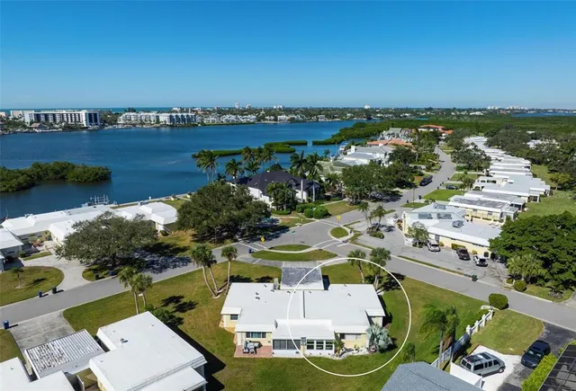 a view of a dining room with furniture and a window