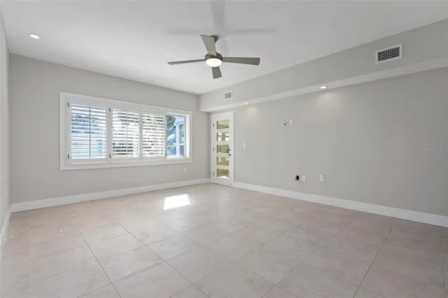 a view of a kitchen with a sink and a window