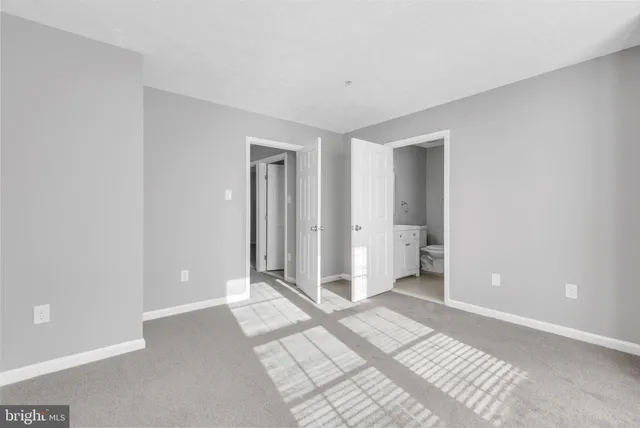 a view of a room with a bathroom