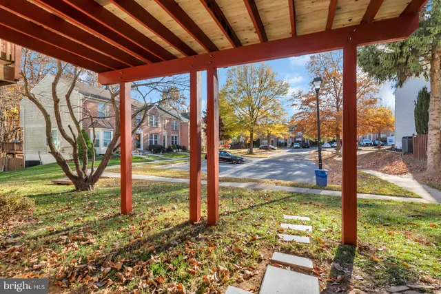 a view of a porch with a yard