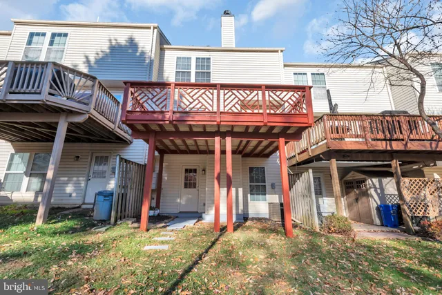 a view of a chairs and table in the patio