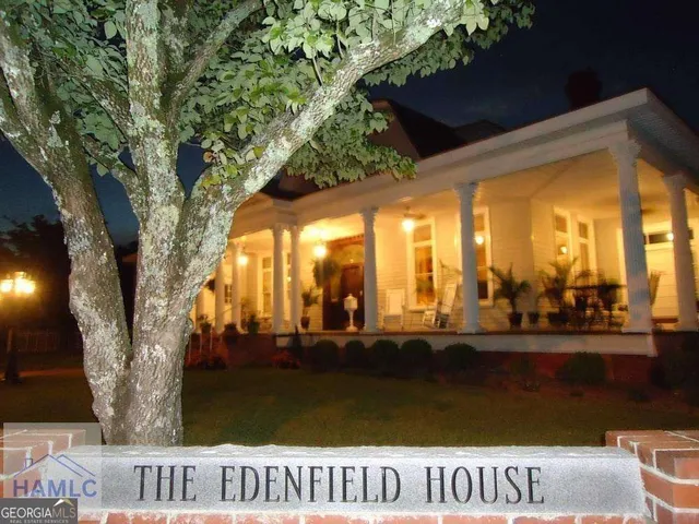 a view of swimming pool with outdoor seating