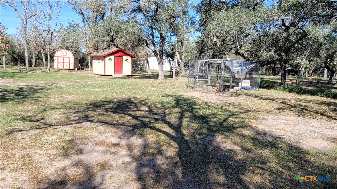 127-129 McAdams Road Goliad, TX 77963 - Photo 30 of 33 a front view of a house with a yard