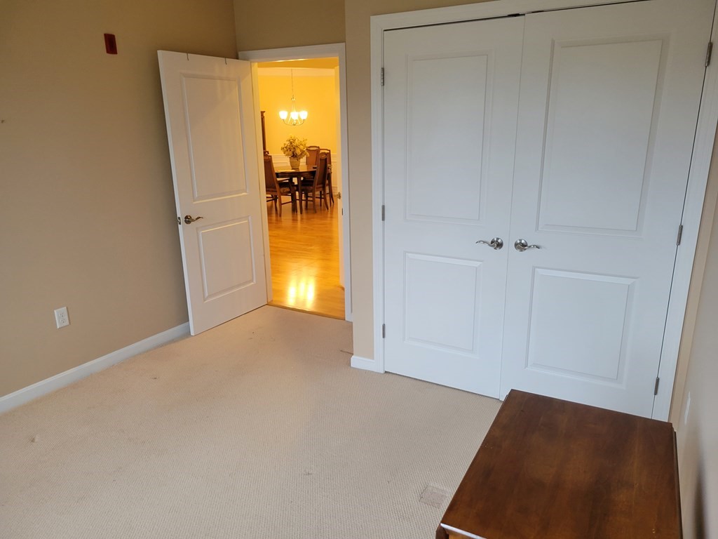 9 Abigail Way, Unit 4010 Reading, MA 01867 - Photo 21 of 37 a view of empty room