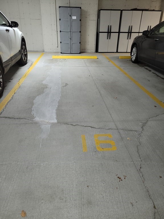 9 Abigail Way, Unit 4010 Reading, MA 01867 - Photo 29 of 37 a car parked on the side of the road