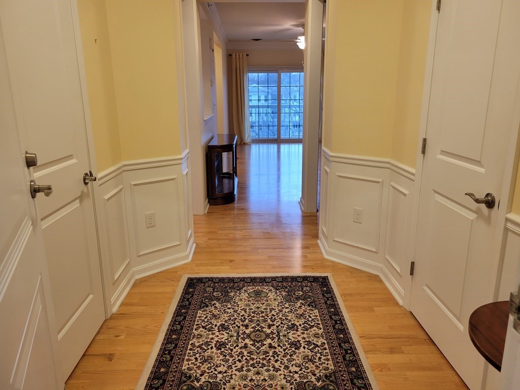 9 Abigail Way, Unit 4010 Reading, MA 01867 - Photo 6 of 37 a bathroom with a sink and a shower