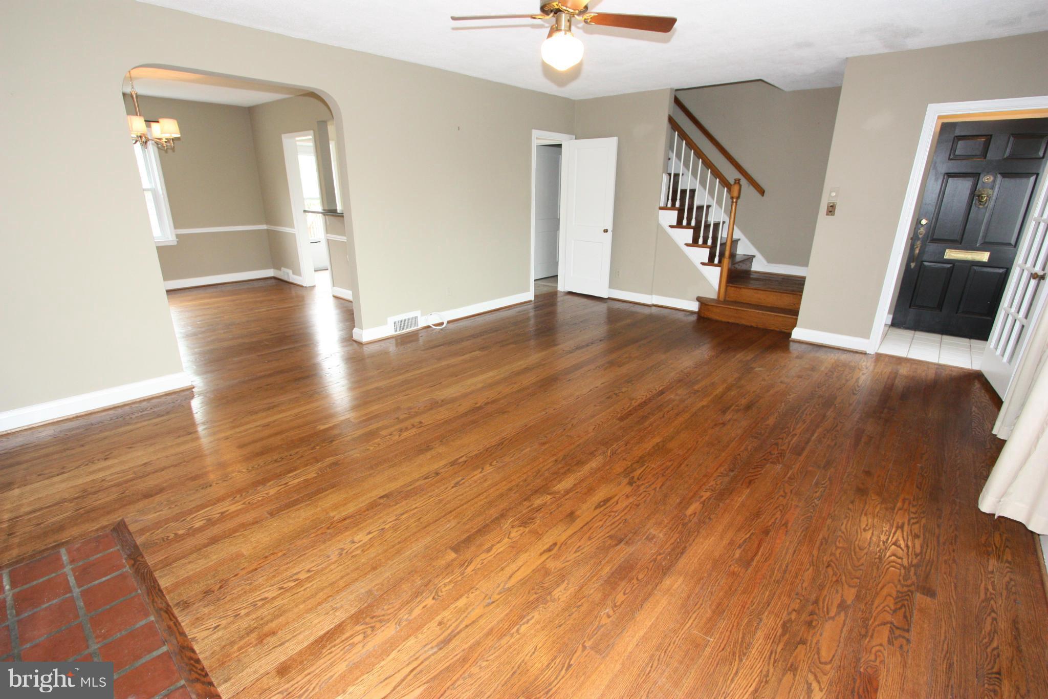 1932 Edgewood Road Parkville, MD 21286 - Photo 12 of 30 wooden floor in an empty room with a window