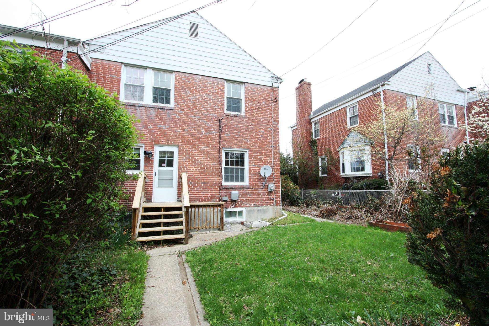 1932 Edgewood Road Parkville, MD 21286 - Photo 25 of 30 a front view of house with yard and green space