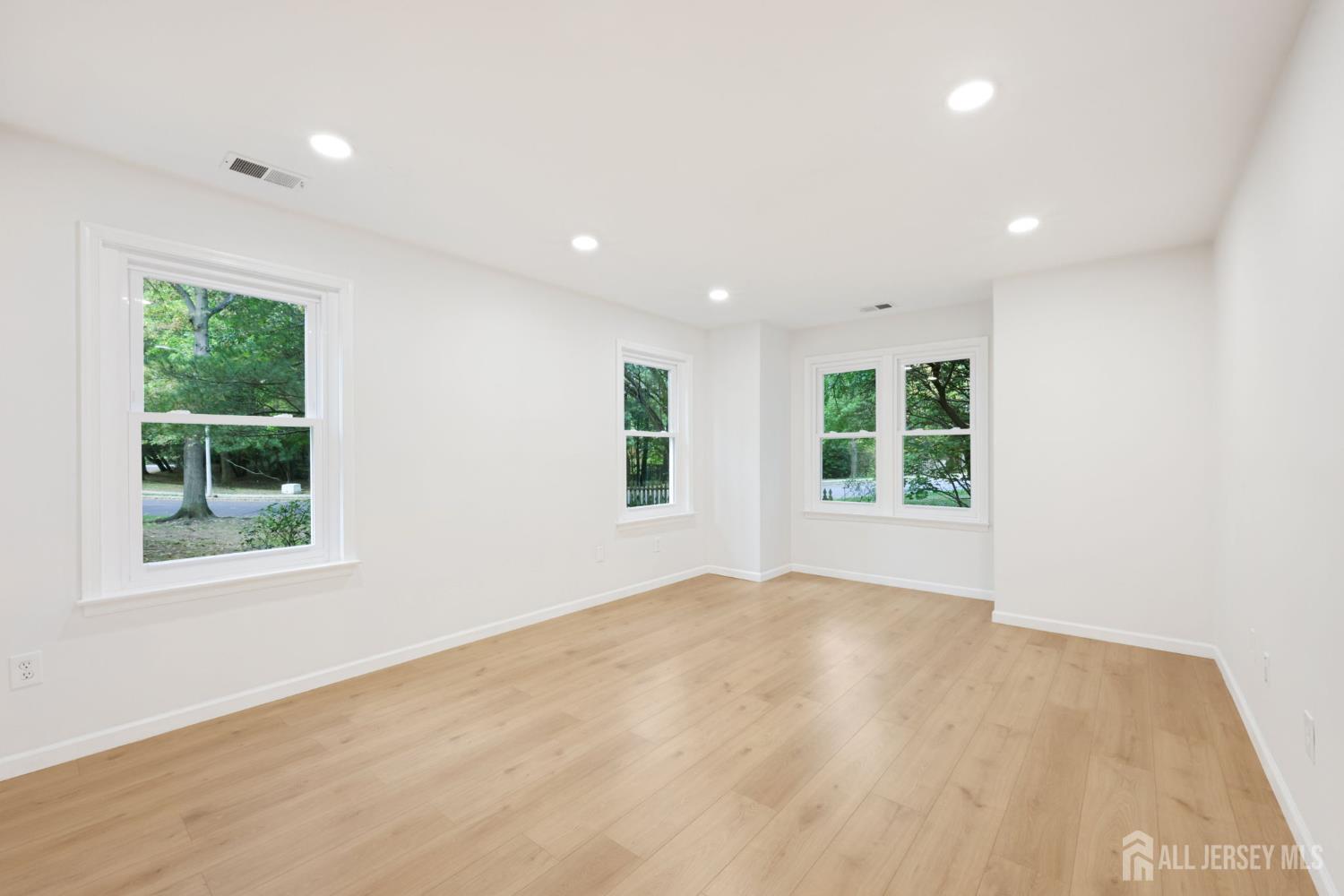 102 Raintree Court Helmetta, NJ 08828 - Photo 11 of 21 a view of an empty room with a window