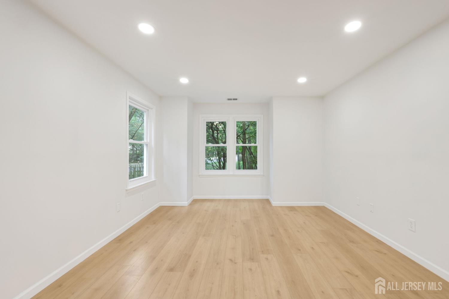 102 Raintree Court Helmetta, NJ 08828 - Photo 14 of 21 a view of an empty room with a window