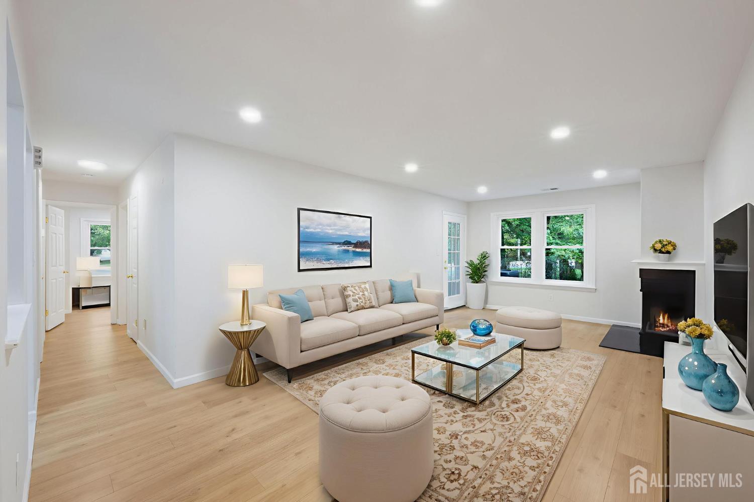 102 Raintree Court Helmetta, NJ 08828 - Photo 2 of 21 a living room with furniture and a flat screen tv