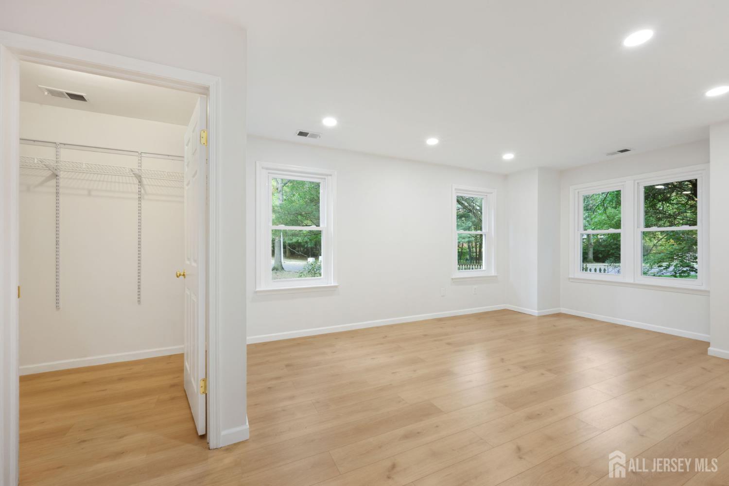 102 Raintree Court Helmetta, NJ 08828 - Photo 10 of 21 a view of an empty room with a window