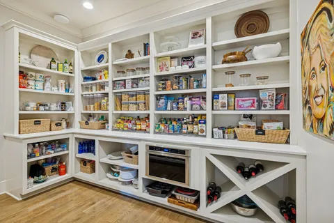a room with furniture and a book shelf