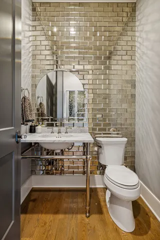 a view of a swimming pool with a patio and a yard