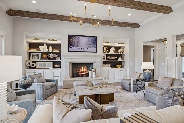 a bed room with furniture and a chandelier