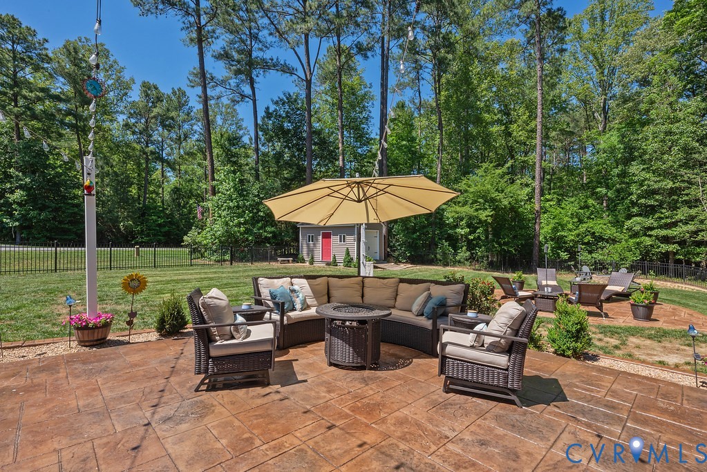 6446 Chestnut Church Road Mechanicsville, VA 23116 - Photo 4 of 49 Stamped concrete patio featuring an integrated fir