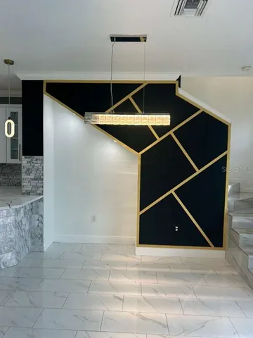 a bathroom with a tub a sink a mirror and a shower