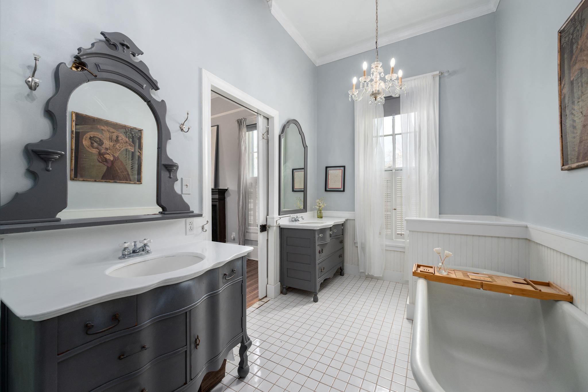 603 East 7th Street Georgetown, TX 78626 - Photo 14 of 33 a bathroom with a sink double vanity granite tub shower and a mirror