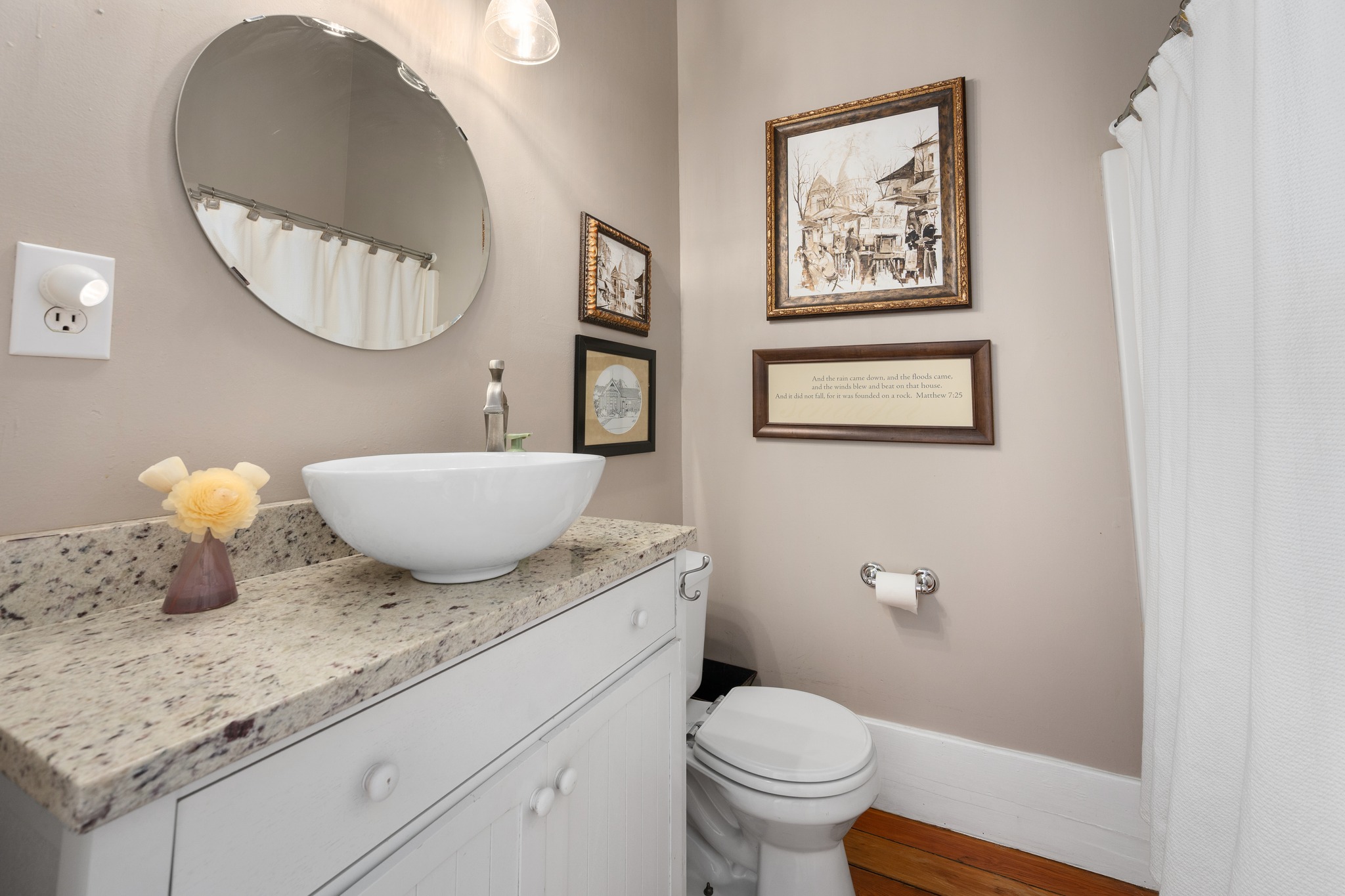 603 East 7th Street Georgetown, TX 78626 - Photo 16 of 33 a bathroom with a granite countertop toilet and a sink