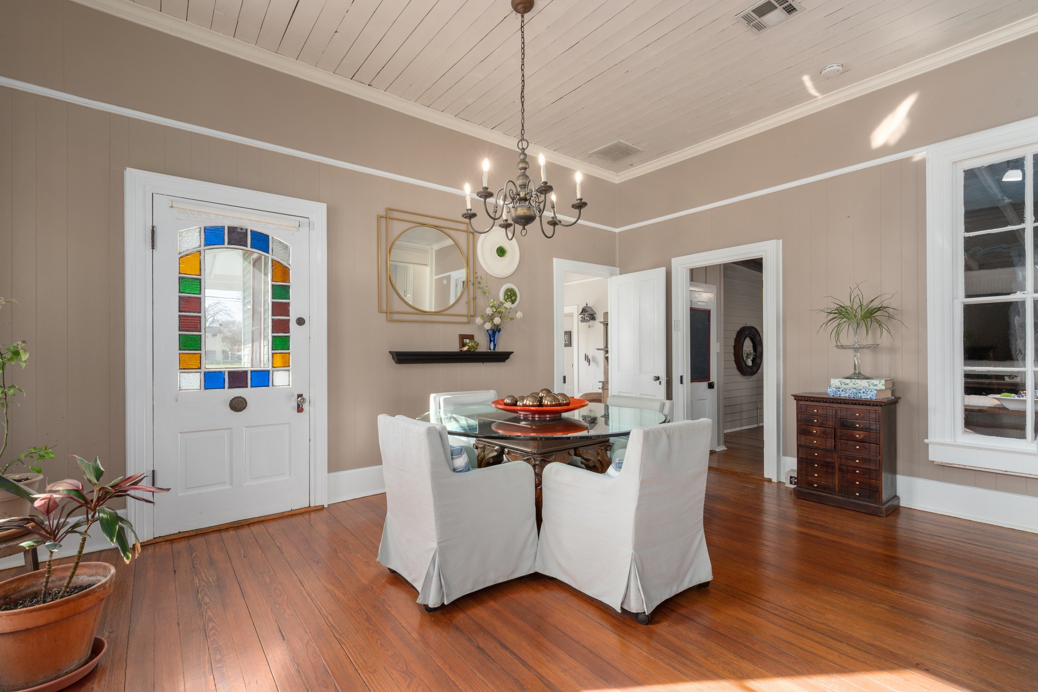 603 East 7th Street Georgetown, TX 78626 - Photo 5 of 33 a living room with furniture and a chandelier