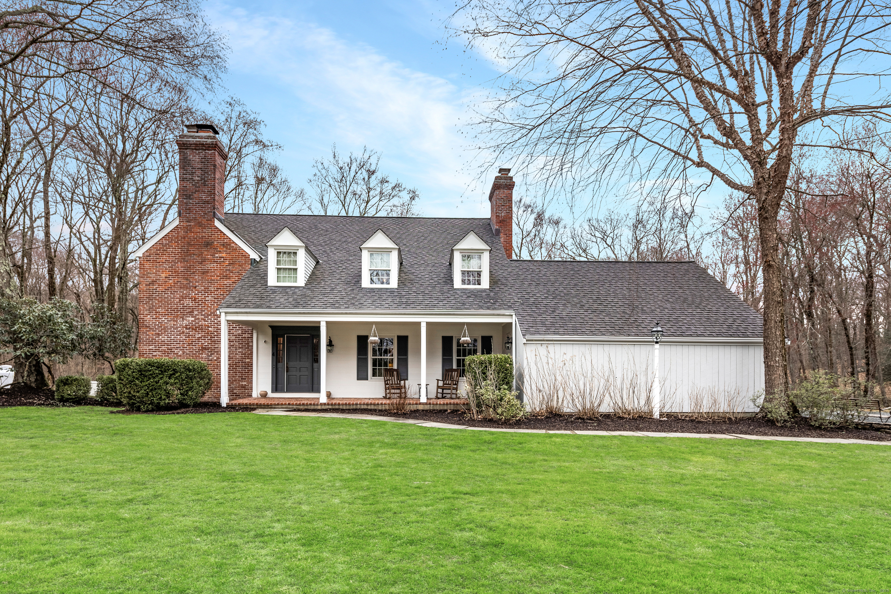 4 Ledgewood Road Redding, CT 06896 - Photo 1 of 32 a view of a house with a yard