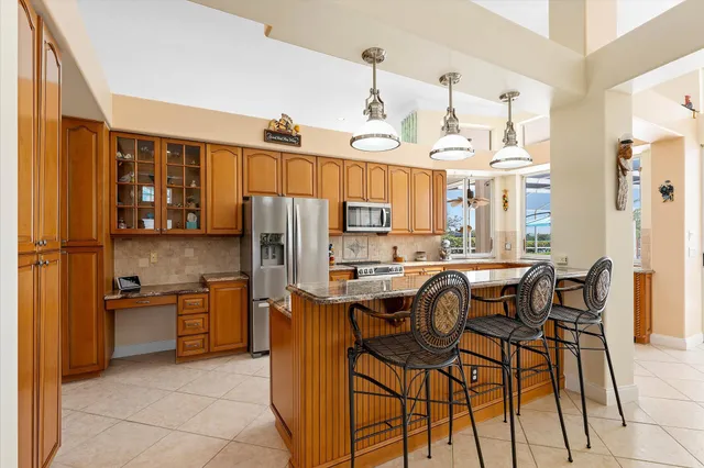 a bedroom with a bed and a desk