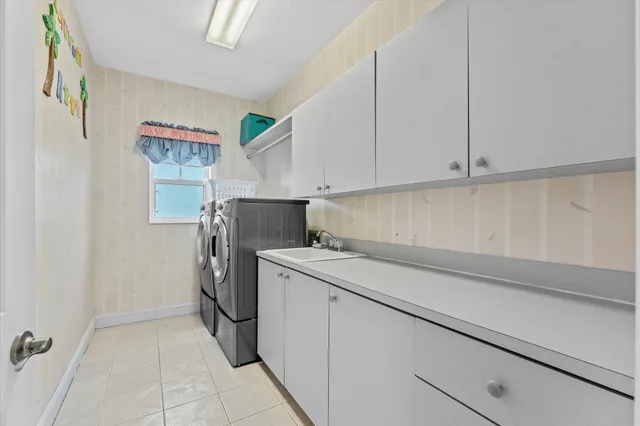 a swimming pool with outdoor seating and yard