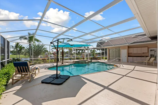a view of a park with palm trees