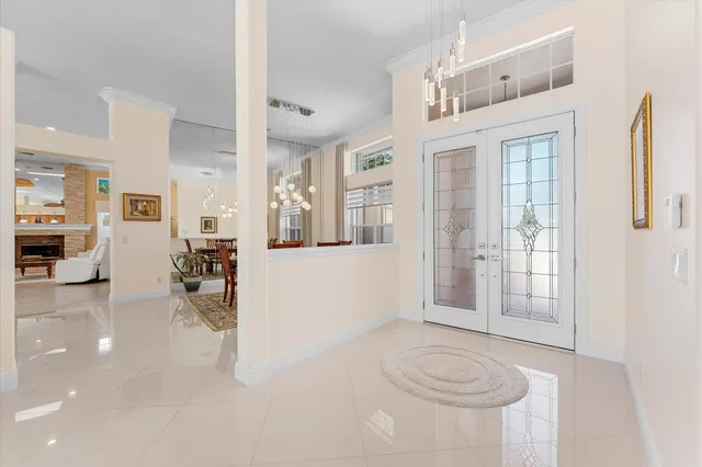 a view of livingroom with furniture and a chandelier