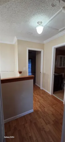 a view of livingroom with wooden floor
