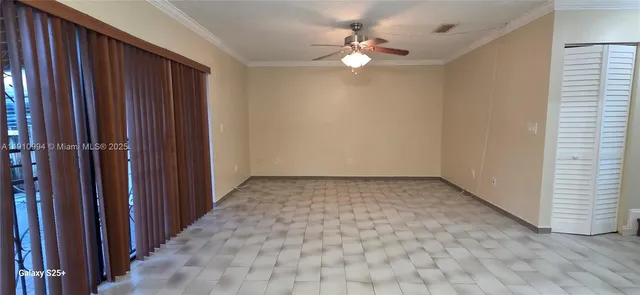 a view of a room with a large window