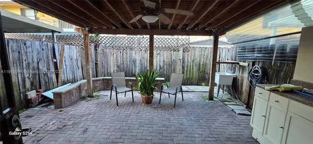 a view of outdoor space with chairs