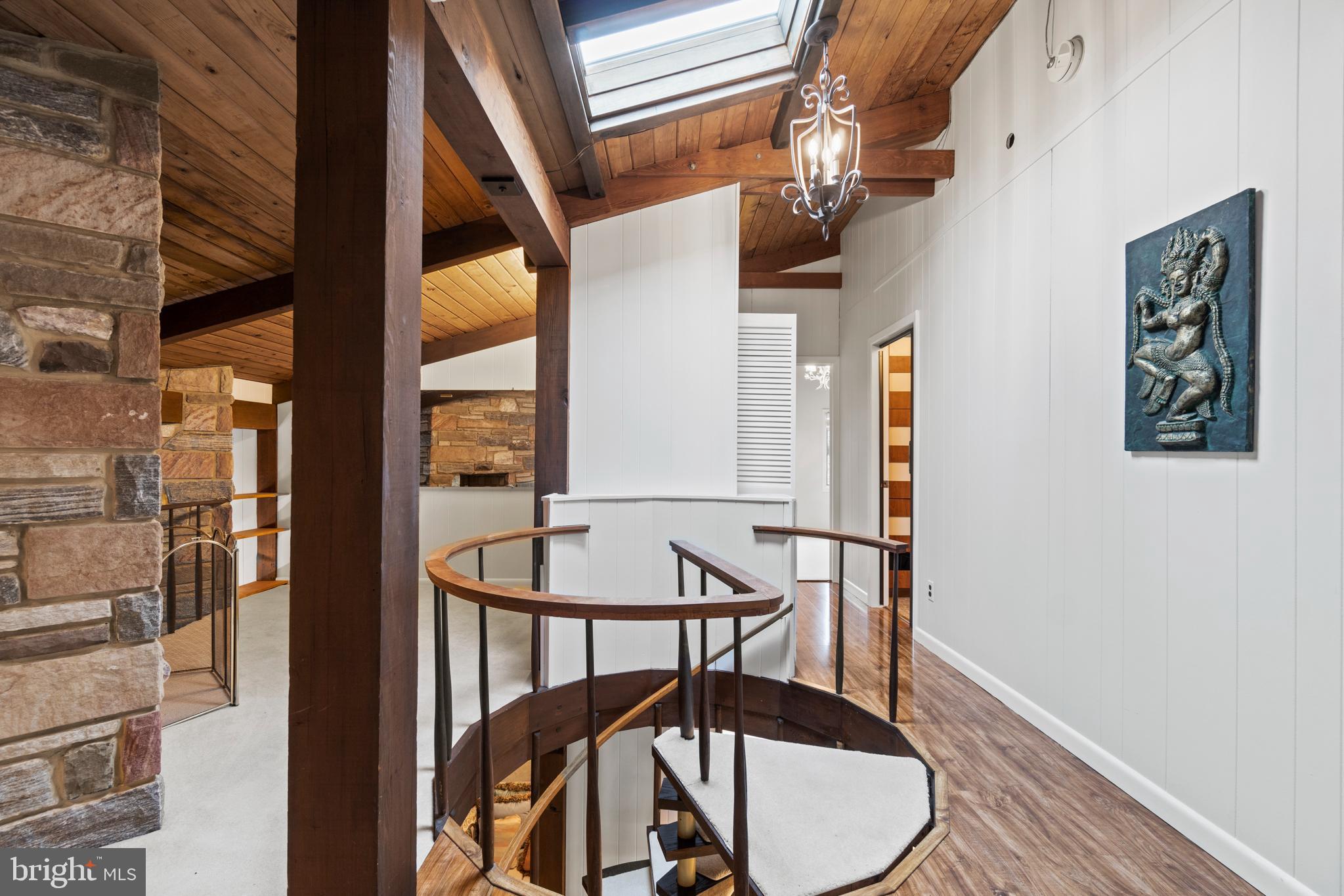 618 Doyle Road Deale, MD 20751 - Photo 23 of 46 Spiral staircase to upper level