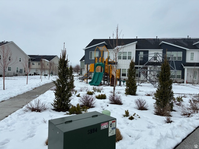 1249 West 1820th Street South Logan, UT 84321 - Photo 15 of 15 Snow covered playground with a residential view